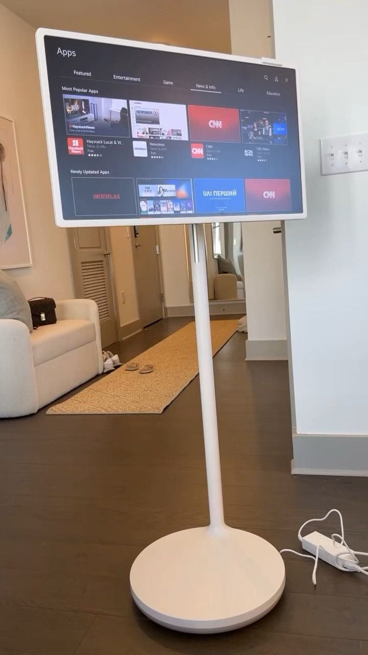 JEESTON 22” Android TV Tablet – Full HD touchscreen with 8MP camera on a wheeled stand..